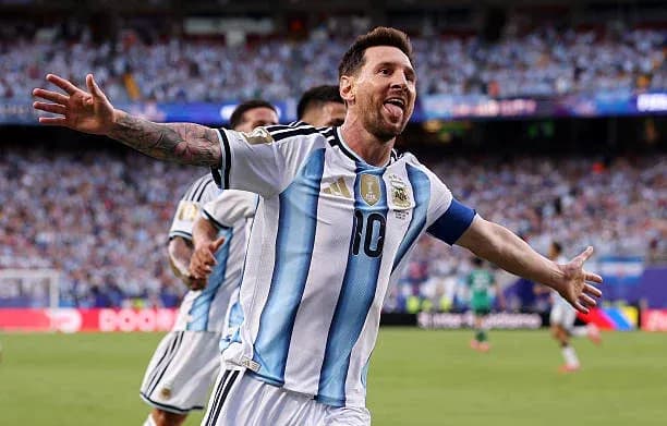 Lionel Messi celebrating a goal for Argentina Lionel Messi celebrating a goal for Argentina