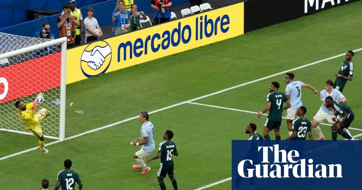 Goalkeeper saving a shot during a football match Goalkeeper saving a shot during a football match