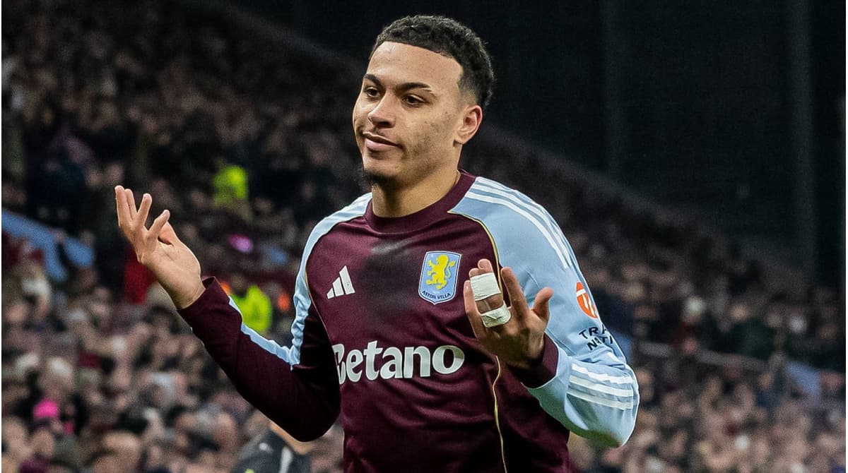 Player gesturing during match in Aston Villa kit Player gesturing during match in Aston Villa kit