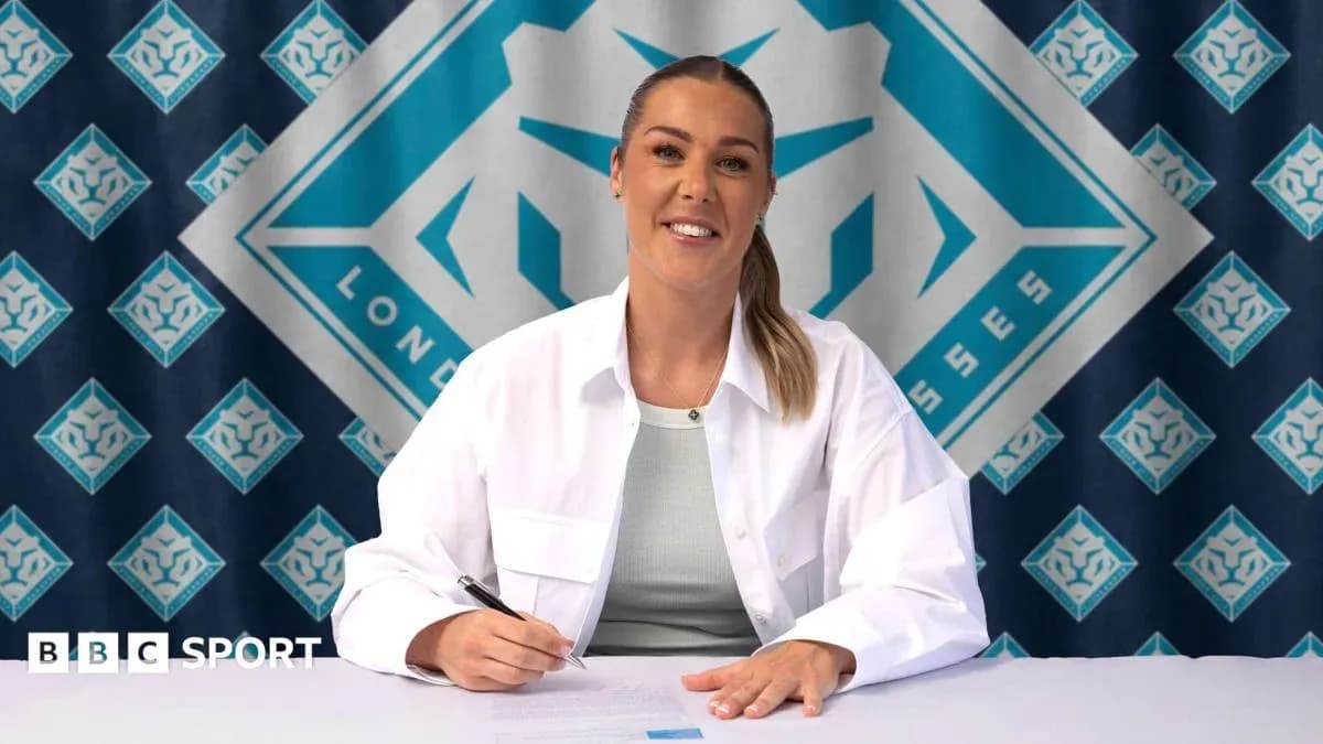Athlete signing contract at press conference table Athlete signing contract at press conference table