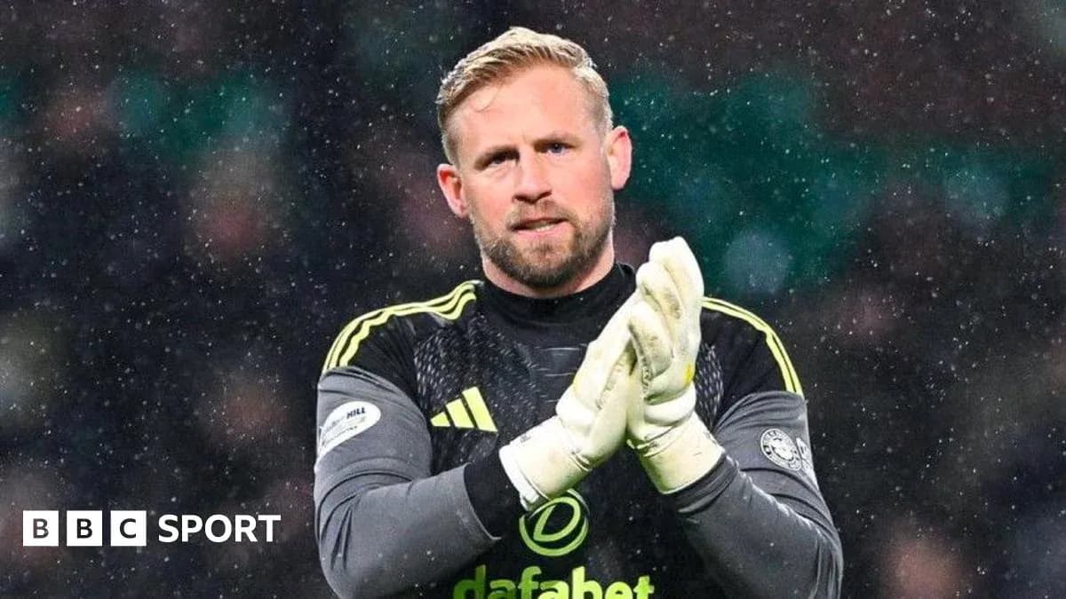 Goalkeeper clapping in snowy conditions during match Goalkeeper clapping in snowy conditions during match