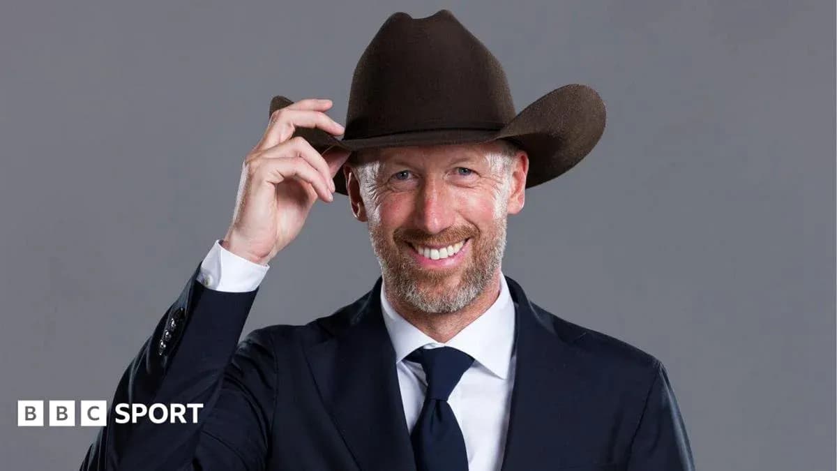 Man in suit and cowboy hat smiling Man in suit and cowboy hat smiling